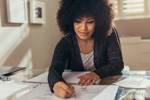 Architect modifying building floor plan