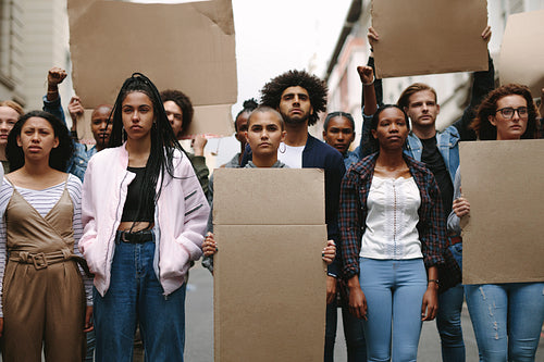 Group of activists protesting with banners 