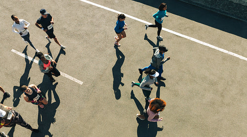 Aerial view of diverse group jogging during a race event