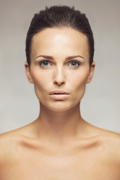 Pretty woman with clean and glowing skin