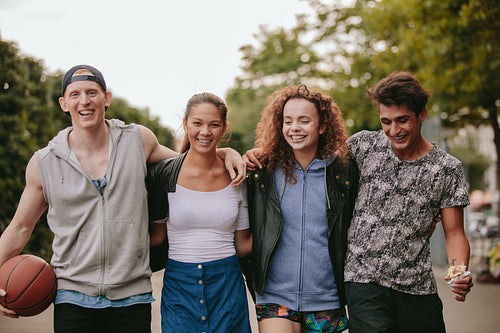 Multiracial group of people enjoying a walk outdoors