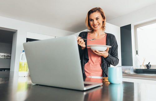 Woman eating breakfast