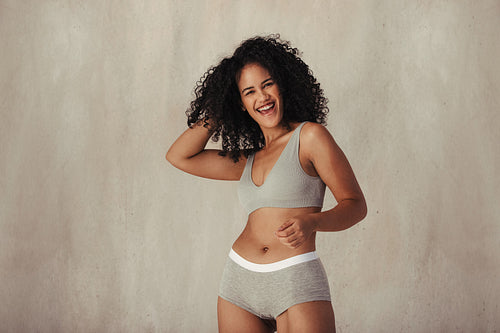 Young woman enjoying being in her natural body