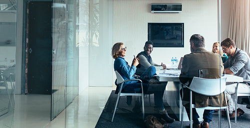 Business people discussing together in meeting