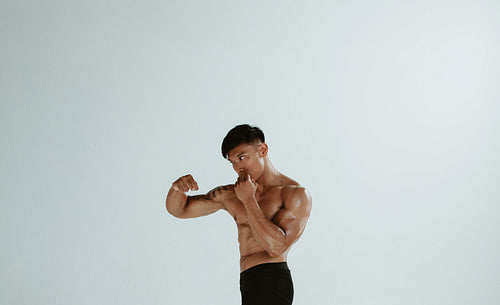 Fit male practising shadowboxing