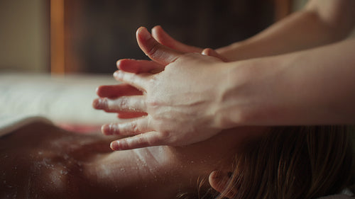 Relaxing facial massage for a young woman at a luxurious spa for wellness and beauty