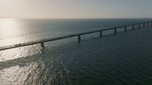 Denmark's Great Belt Bridge: A Scenic Roadway at Sunset