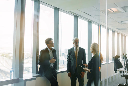 Corporate professional having a standing meeting