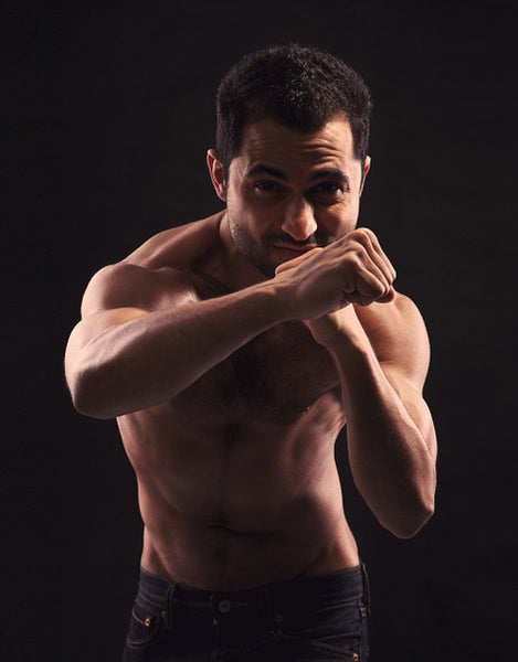 Shirtless Man Ready for Combat