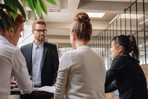 Group of business people having meeting together