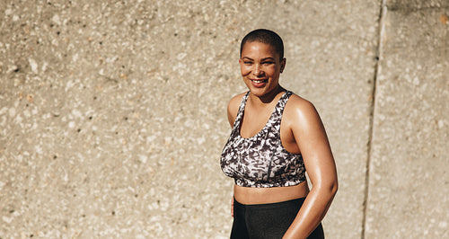 Happy woman after workout session