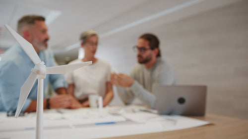 Sustainable engineers using 3D modeling to create a wind turbine design