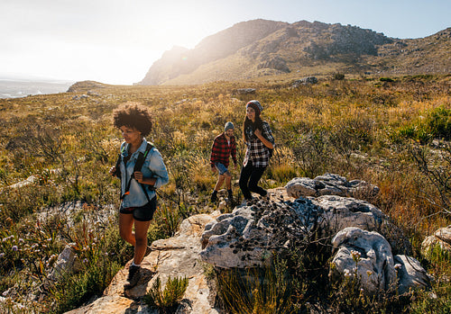 Young people on mountain hike