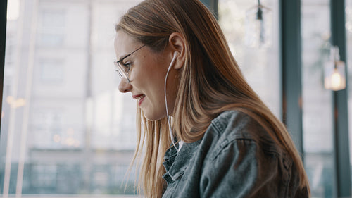 Freelancer working on laptop at a restaurant