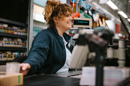 Friendly supermarket cashier