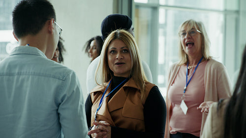 Happy people networking at a conference