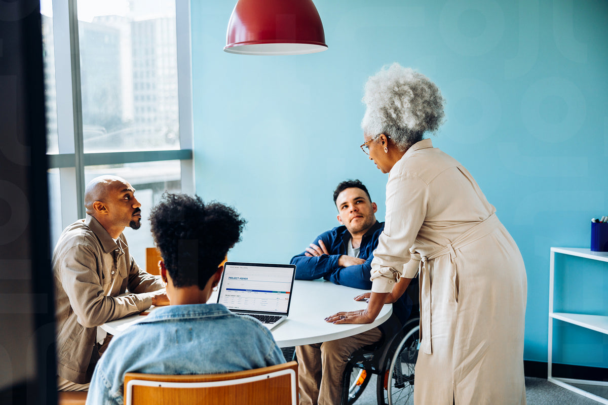 Guiding the room: Senior leader directing team discussion – Jacob Lund ...