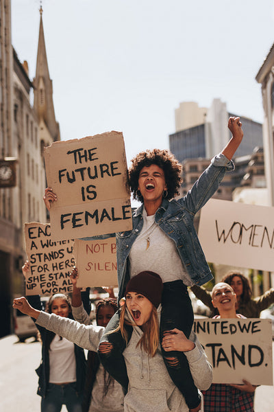 Aggressive protesters marching on the road