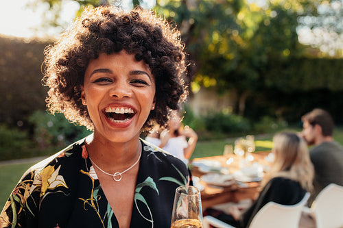 African woman enjoying at outdoors party