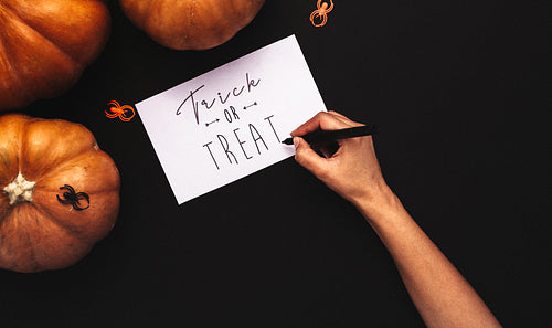 Halloween theme flat lay on black background