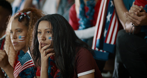 Excited American sports fans celebrating victory