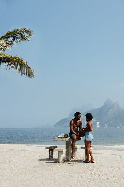 Romantic couple enjoying a sunny day at Ipanema Beach