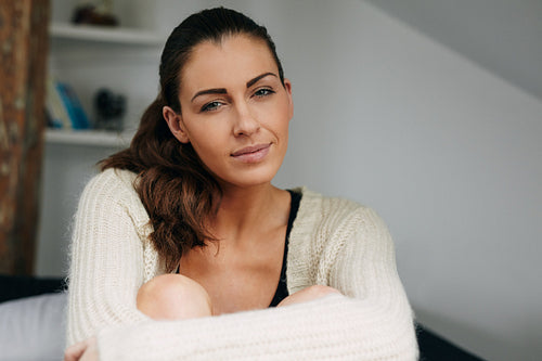 Beautiful relaxed woman at home