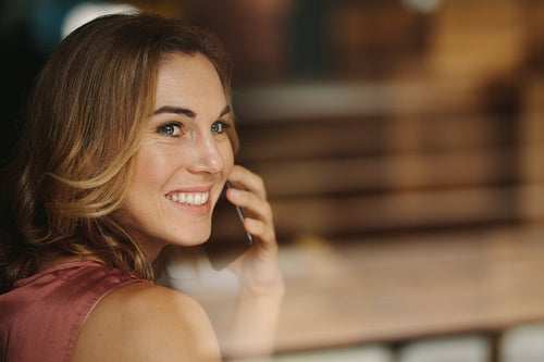 Woman talking over mobile phone