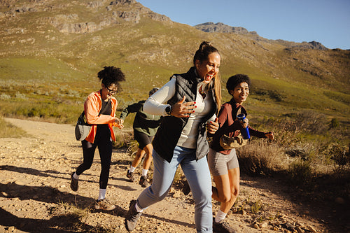 Group hiking on scenic mountain trail