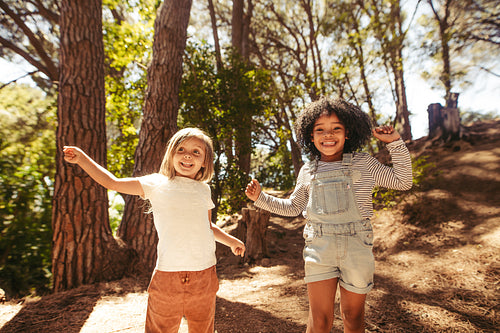 Cute kids dancing in park