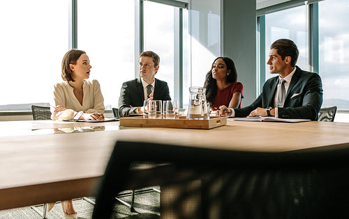 Business people having meeting in a board room