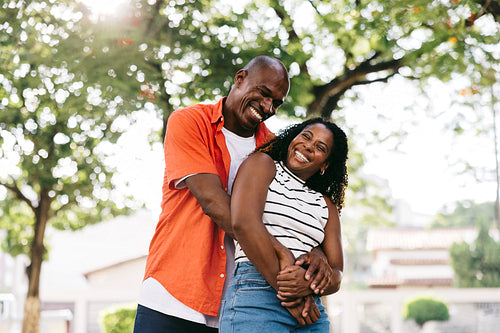 Happy couple enjoying a fun moment together outdoors