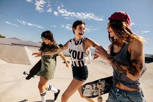 Urban girls enjoying at skate park