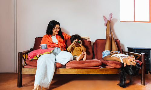 Happy family enjoying quality time together in a cozy indoor setting
