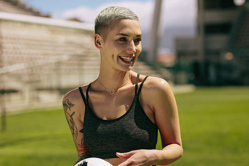 Young woman footballer at the ground