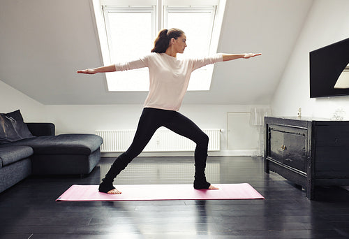 Young woman practicing yoga