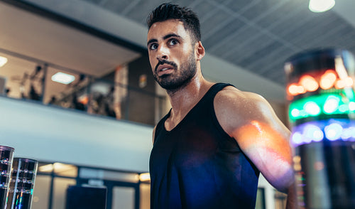 Sportsman with lights around during reaction time training