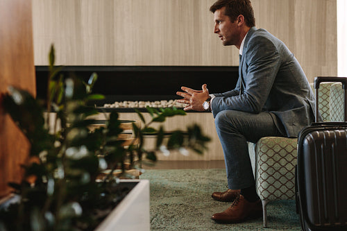 Business traveler waiting for this flight