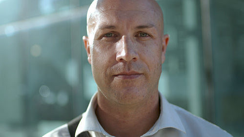 Portrait of a mature businessman outside