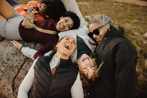 Friends laughing together outdoors