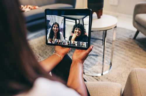 Female entrepreneur attending a virtual meeting with her global partners