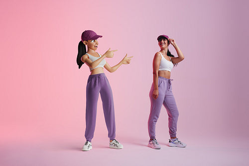 Cheerful young woman smiling at her metaverse avatar