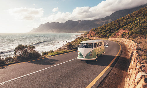 Mini van on coastal road