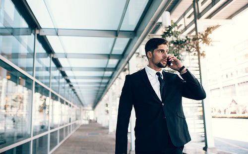 Businessman talking on mobile phone