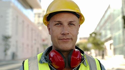 Confident man working at construction site