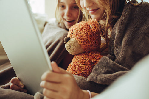 Girls watching a movie on a tablet pc