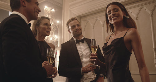 Group of people taking a selfie at party