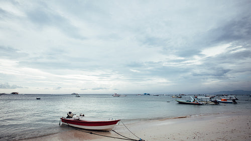 Beautiful beach with small boat