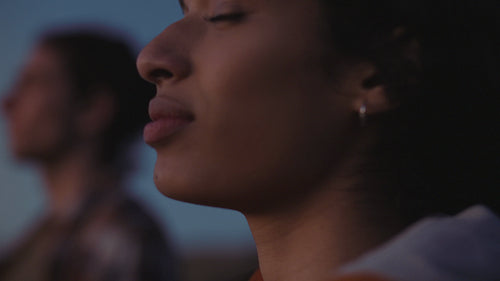 Woman enjoying standing in the fresh air in nature