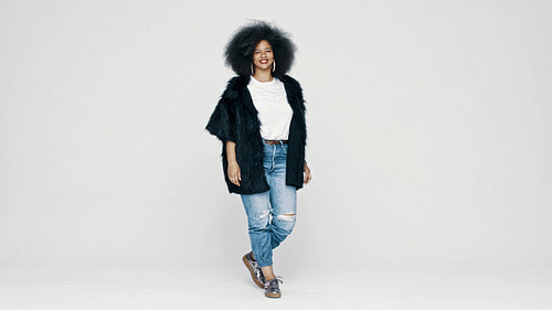 Stylish woman in afro hairstyle